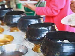 HD:Rituals of the locals.rice in bowl.Buddhist merit Stock Footage