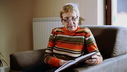 Senior woman reading a book Stock Footage