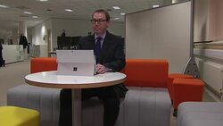 HMRC's Peter Schofield browsing website News Clip