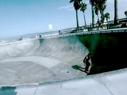 WS SLO MO Shot of skateboarder doing backside air in skate park bowl / Venice, California, United States Stock Footage