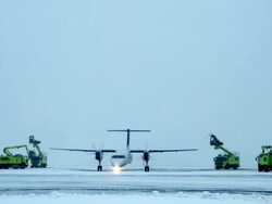 A small plane being de-iced Stock Footage