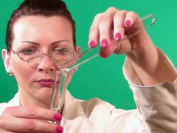 Lab worker checking test tube Stock Footage
