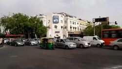 A busy traffic intersection at the Connaught Place CBD in New Delhi,  India Stock Footage