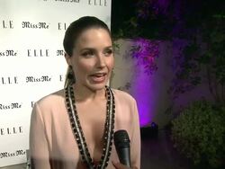 INTERVIEW: Sophia Bush on on her dress, on coming out tonight at Elle Magazine And Sarah Hyland Hosts Songbirds' Miss Me Album Release Party Stock Footage