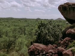 WS Helicopter cruising past rocks / Save Valley, Southern Zimbabwe, Zimbabwe Stock Footage