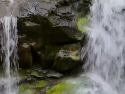 ECU TD Detail of Hoopii Falls and moss covered rocks / Kapaa, Kauai, Hawaii, United States Stock Footage