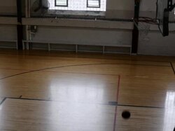 WS Young man playing basketball and practicing inside  gymnasium / Minneapolis, Minnesota, United States  Stock Footage