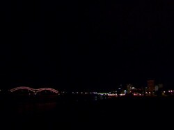 WS City skyline at night as lightning strikes on harnando de soto bridge / Memphis, Tennessee, United States Stock Footage