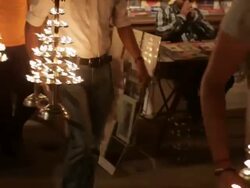 MS Men carrying out oil lamps for Aarti Puja ceremony / Varanasi, India Stock Footage