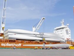 WS T/L View of Cranes lifting giant wind turbine blades off container ship / Macarthur, Victoria, Australia Stock Footage
