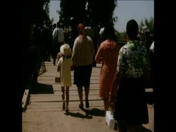 SYND 11 08 70 RESIDENTS ON BANKS OF THE RIVER JORDAN MAKE CROSSING DURING LULL IN FIGHTING News Clip