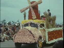 Blankenburg, Belgium, procession in traditional costumes and fancy dress, flower festival, perriot clowns, etc Stock Footage