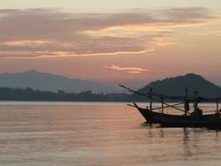 Fishing boat floating on the sea. (Time lapse) Stock Footage