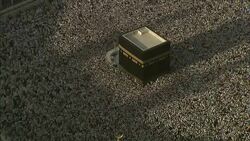 A sea of Islamic pilgrims gather around the Kaaba in Mecca. Stock Footage