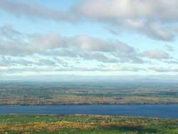 WS ARIEAL View of Cloud flowing over Chestnuhook lake / Maine, United States Stock Footage
