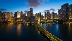 View from Brickell Key, a small island covered in apartment towers, towards the Miami skyline, Miami, Florida, USA - Time lapse Stock Footage