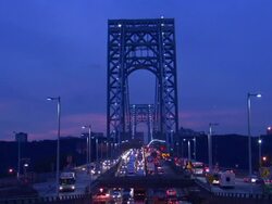 Traffic streams across a suspension bridge. Stock Footage