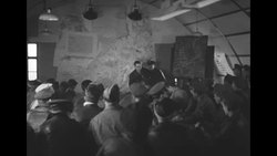 USAAF pilots receive instructions prior to bombing raid during World War II News Clip