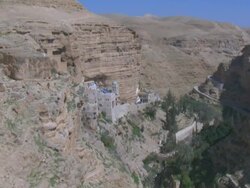 Aerial Saint George Monastery in the Wadi Kelt, Judean desert, Israel Stock Footage