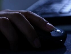 Woman using a computer mouse  Stock Footage