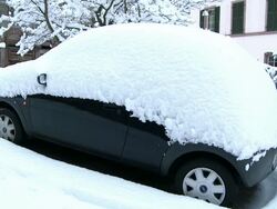 MS Heavy snow layers on car in winter / Saarburg, Rhineland-Palatinate, Germany Stock Footage