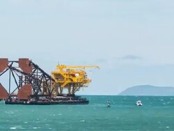 Oil rig being towed by a small boat. Stock Footage
