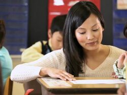 CU PAN Student getting help from teacher / Richmond, Virginia, United States   Stock Footage