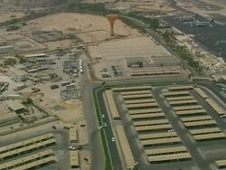 WS AERIAL PAN ZI ZO Shot of many airplanes being loaded at airport / Qatar Stock Footage