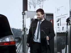 HD DOLLY: Man Filling Up A Car Gas Tank Stock Footage