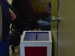 MS Voters deposit their completed ballots at early voting location five days before presidential election / Toledo, Ohio, United States Stock Footage