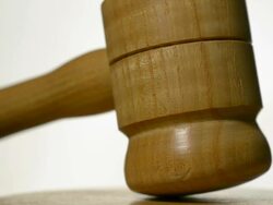 Justice. A wooden gavel striking a sounding block. Stock Footage
