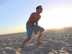 Men playing beach volleyball. - Slow Motion - filmed at 240 fps Stock Footage