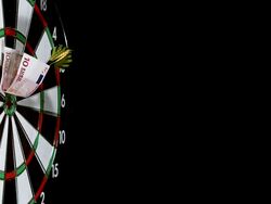 Dart with Money hitting Dartboard against Black background, Slow motion Stock Footage