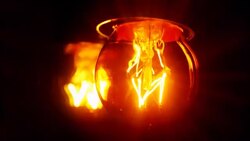 The filament of a light bulb flickers. Stock Footage
