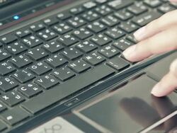 Close up of Business Woman Typing On Laptop Keyboard Stock Footage