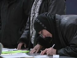 November 2, 2010 ZO Voters signing in to receive ballots for the midterm election / Dearborn, Michigan, United States Stock Footage