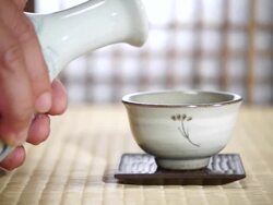 CU SLO MO Shot of Pouring Sake into cup / Seoul, South Korea Stock Footage