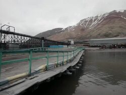 The port of Pyramiden, the Russian settlement and coal mining community on the archipelago of Svalbard, Norway Stock Footage