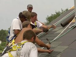 MS Shot of five workers hammering / Chelsea, Michigan, United States Stock Footage