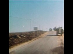 SYND 9-10-73 ADVANCING ISRAELI AMMUNITION TRUCKS COME UNDER FIRE Instructional Video