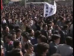 April 27, 1989 FILM MONTAGE WS Protestors marching and chanting in Tiananmen Square/  Beijing, China/ AUDIO Stock Footage