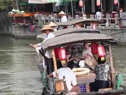 MS View of tour boats on river in village of Zhujiajiao / Shanghai,  China Stock Footage
