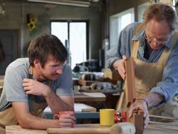 Caucasian father teaching son woodworking Stock Footage