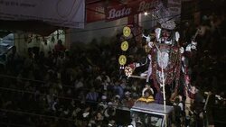 A huge crowd gathers around a Diwali float in India. Stock Footage