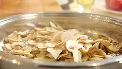 Preparing mushroom meal Stock Footage