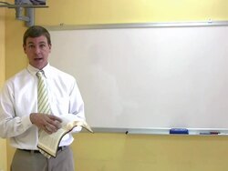 Man teaching with Bible and blank board Stock Footage