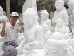 MS Stone mason makes Buddha statue made of marble / Mandalay, Mandalay Division, Myanmar Stock Footage