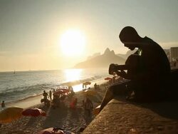 Ipanema Beach, Man playing the guitar Stock Footage