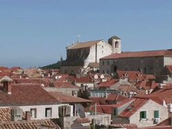 MS ZO Church and rooftops of Dubrovnik, UNESCO World Heritage Site / Dubrovni, Croatia  Stock Footage
