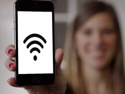 Smart phone young woman with wifi internet Stock Footage